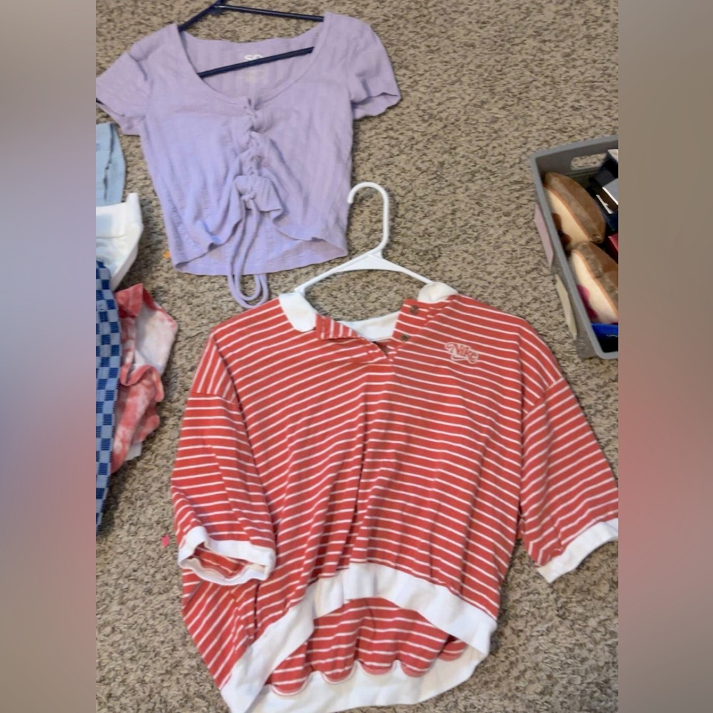 1 Nike golf crop too and 1 purple crop top